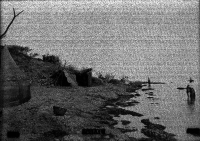 Pescadores a orilla de lago en el "Fuerte"