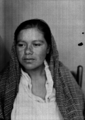 Mujer de condición humilde presunta detenida, retrato