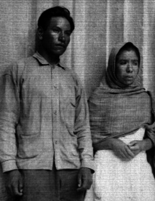 Hombre y mujer de condición humilde detenidos, retrato