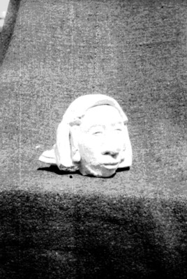 Cabeza antropomorfa con estuco procedente de Palenque