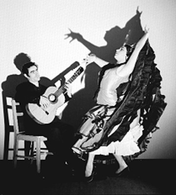 Jóse Muñoz y acompañante durante un ensayo, retrato
