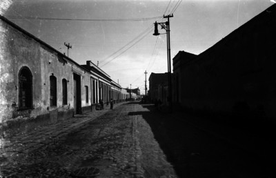 Obras de empedrado en una calle del Distrito Federal